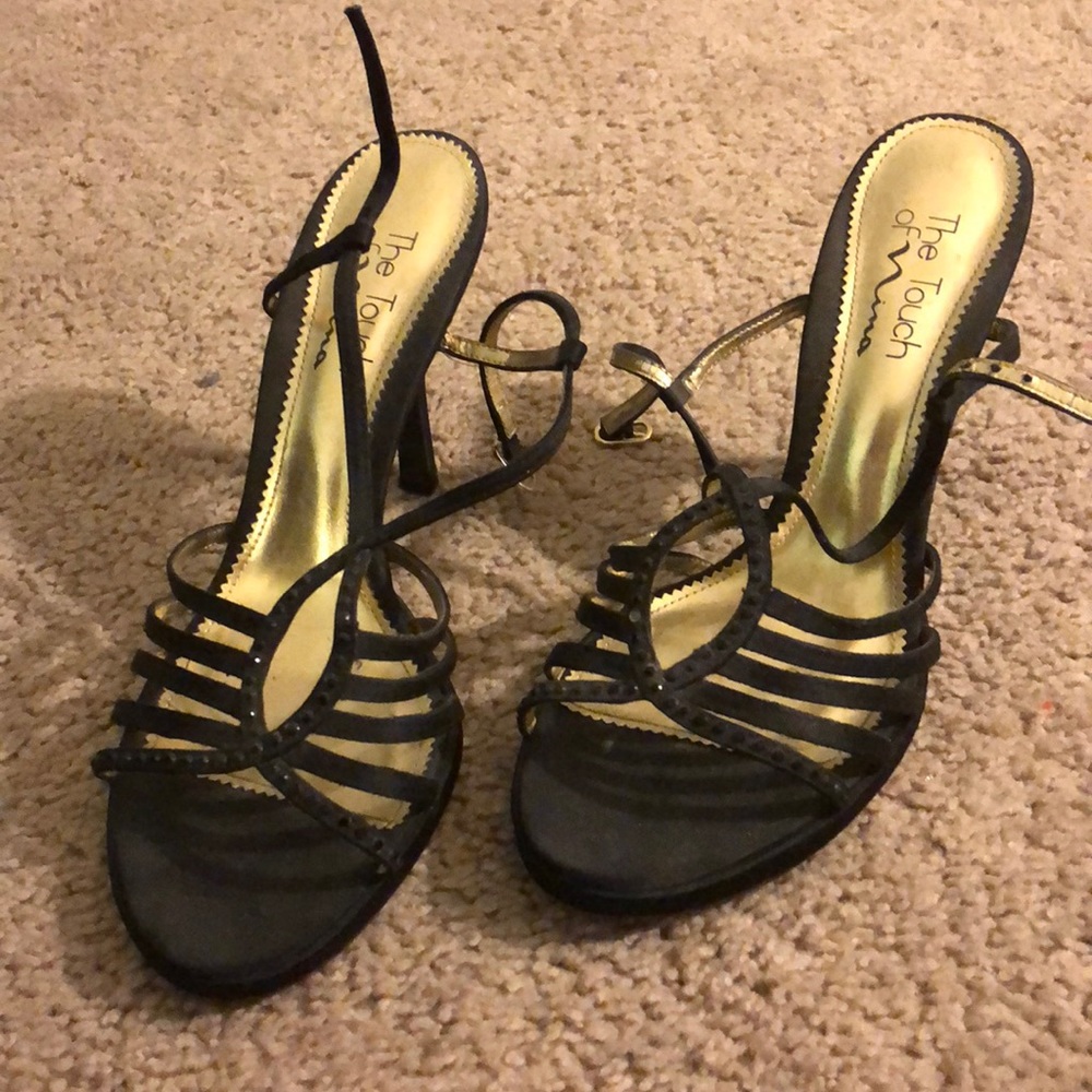 Lightly worn black strappy heels